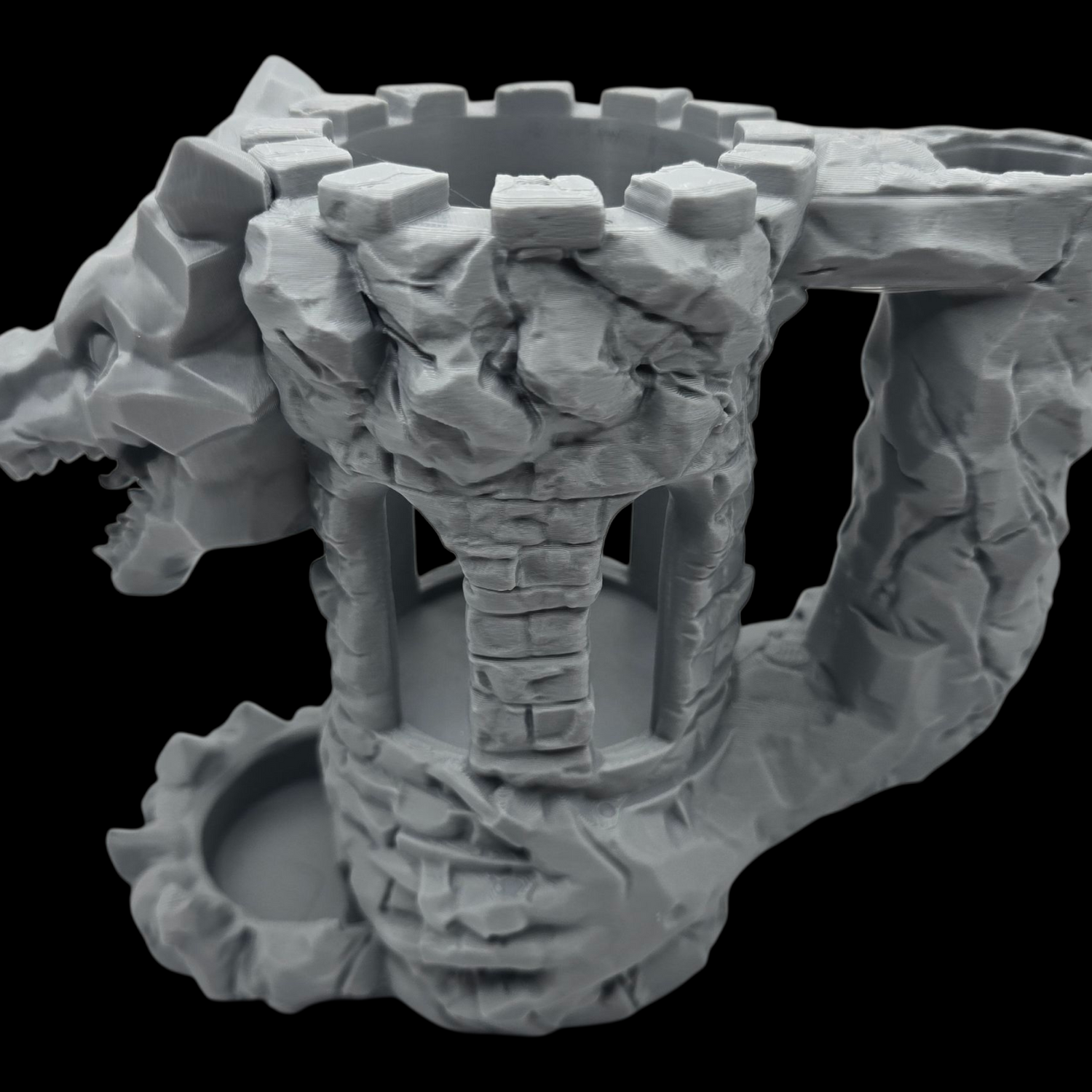 Stone-like sculpture with a central cylindrical structure on a black background